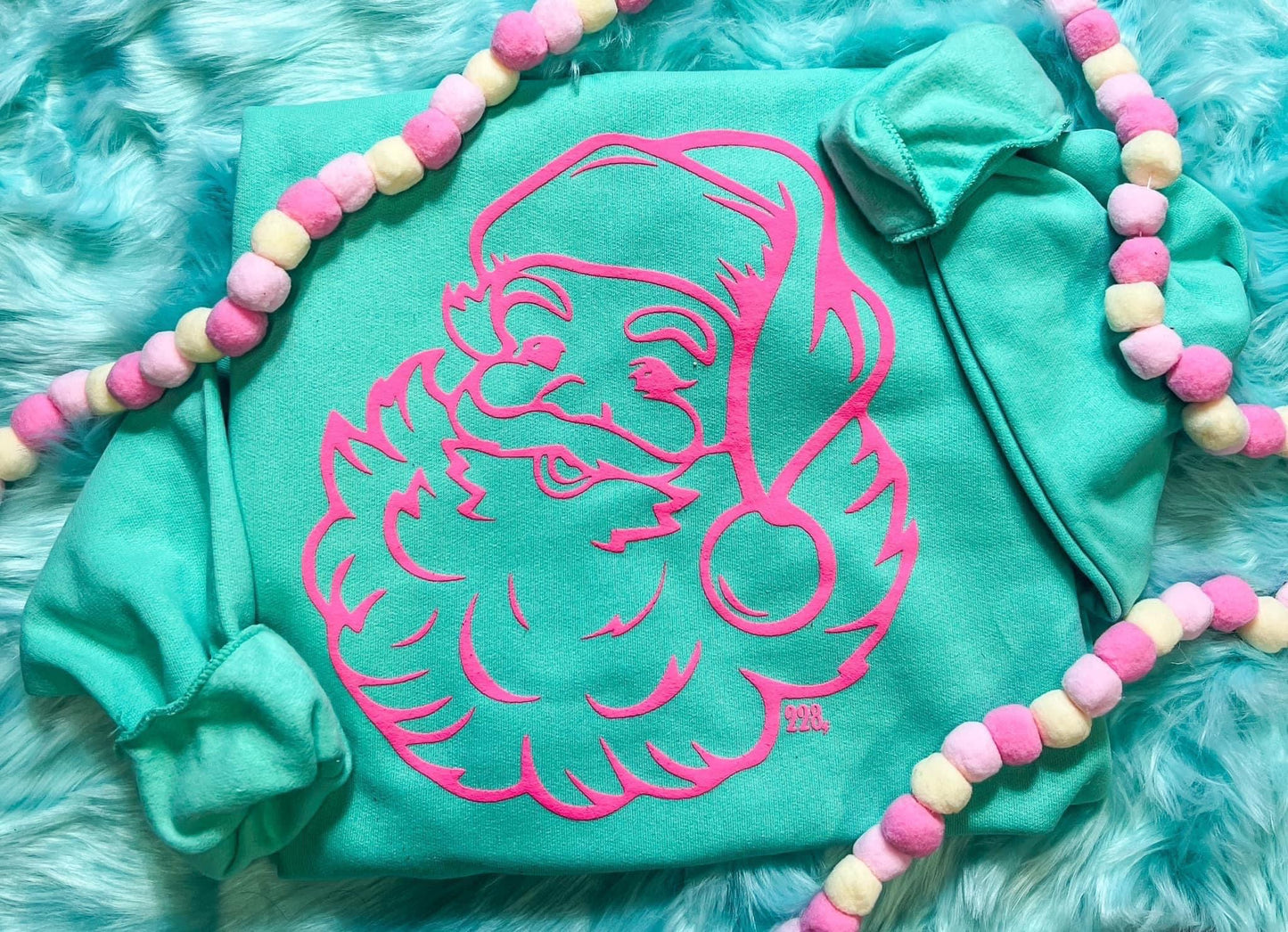 Pink puff Santa on cool mint